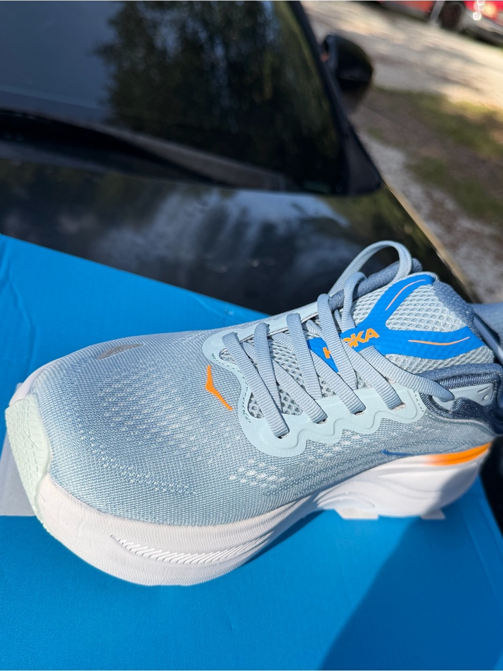 Hoka Men's Light Blue Athletic Shoes with Orange Accents